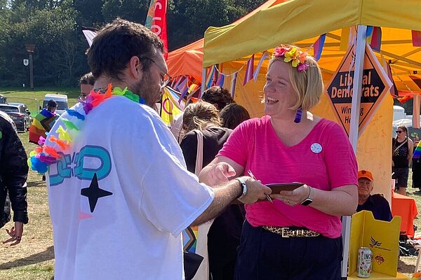 Zöe Franklin talking to a supporter at Pride
