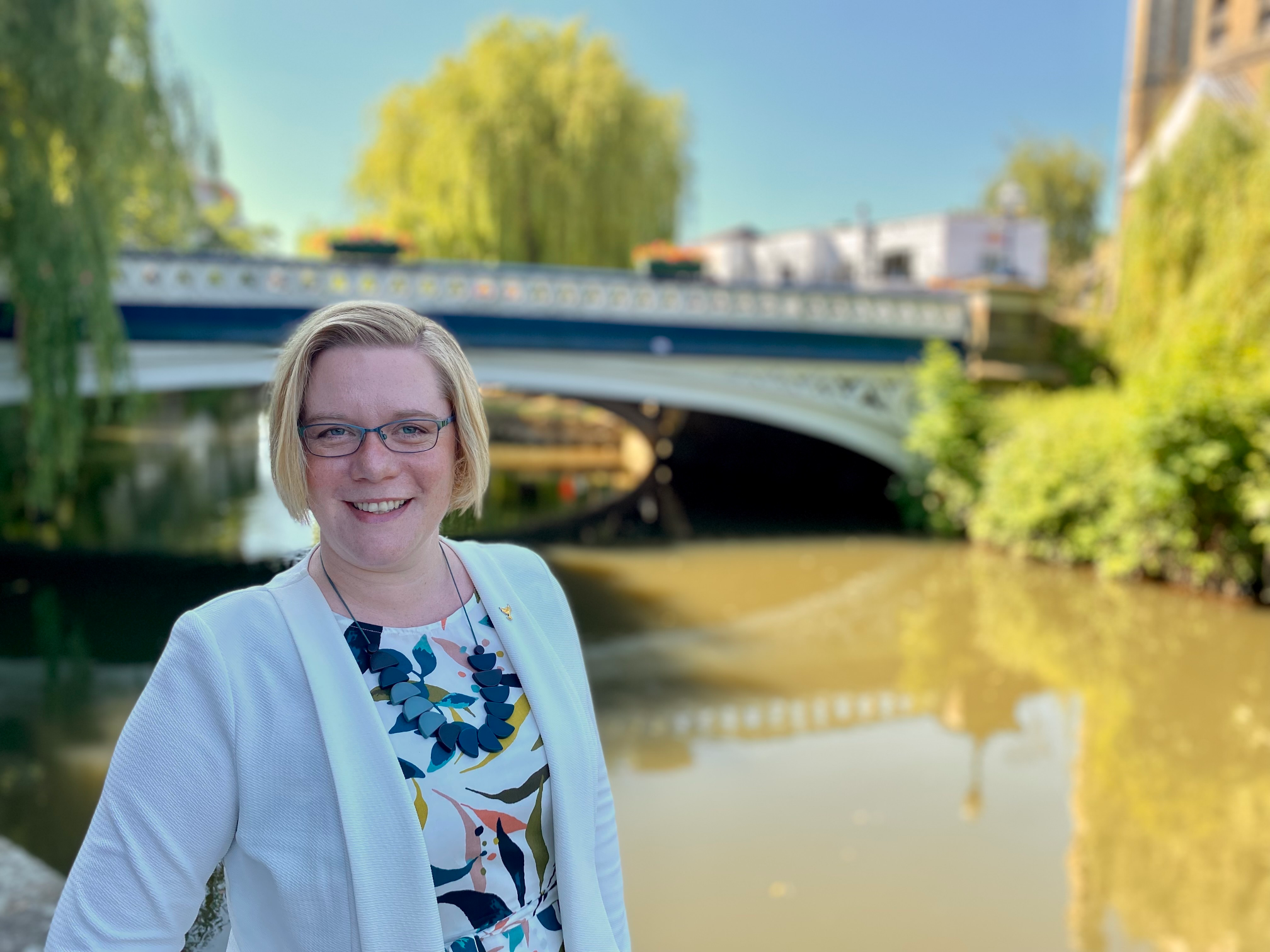 Zöe Franklin in front of town bridge